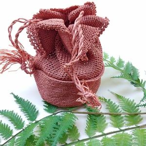 Blush drawstring straw bag
